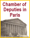 Chamber of Deputies, Paris, France.  The original building, begun in 1722, was a palace.  It was enlarged at various times and declared national property during the French Revolution.  The side facing the river, shown here, was built in 1804 and 1807, in the style of a Greek temple. 